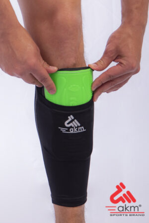 Soporte Canillera negro en lycra poliester con bolsillo